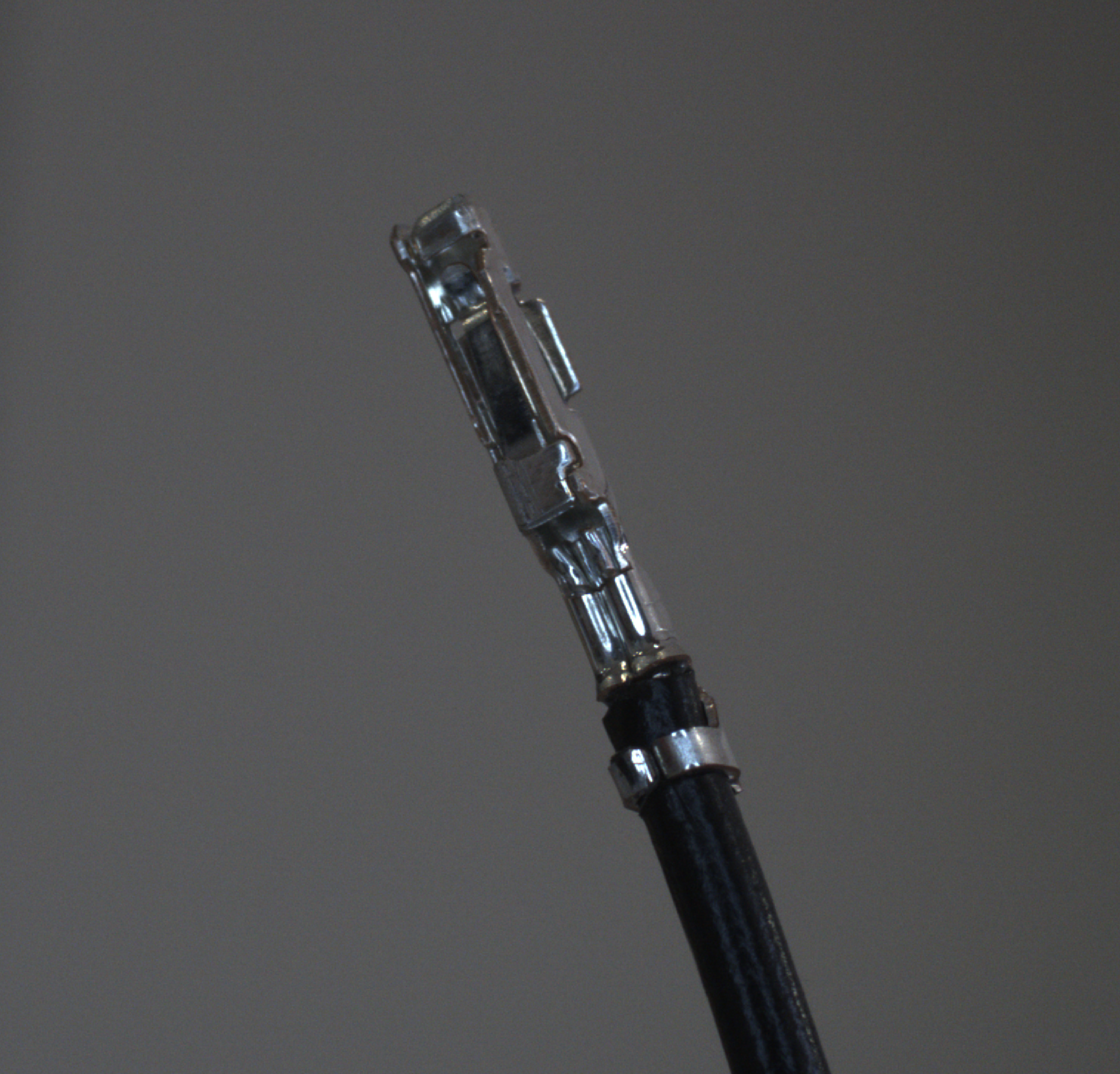 Close-up of a crimped wire harness terminal
